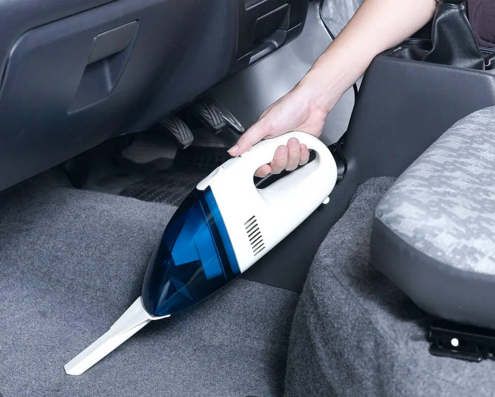 vacuum carpet in a car