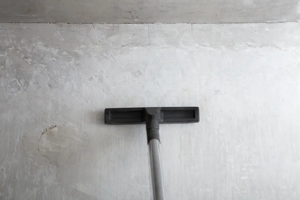 vacuum the concrete floor