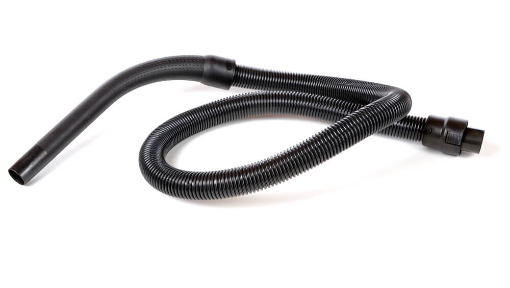 How to get something out of a vacuum hose